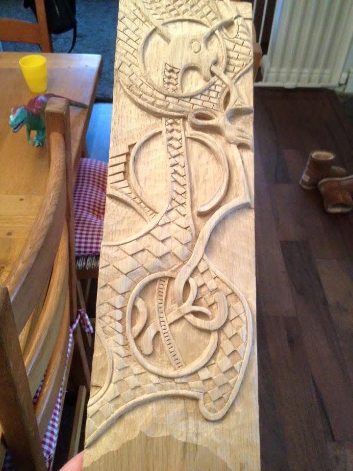 Intricate Norse wood carving image